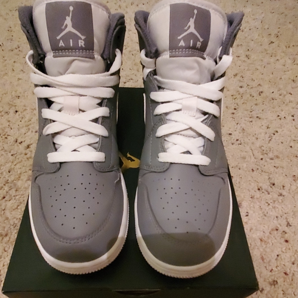 Worn once, no flaws other than the soles.